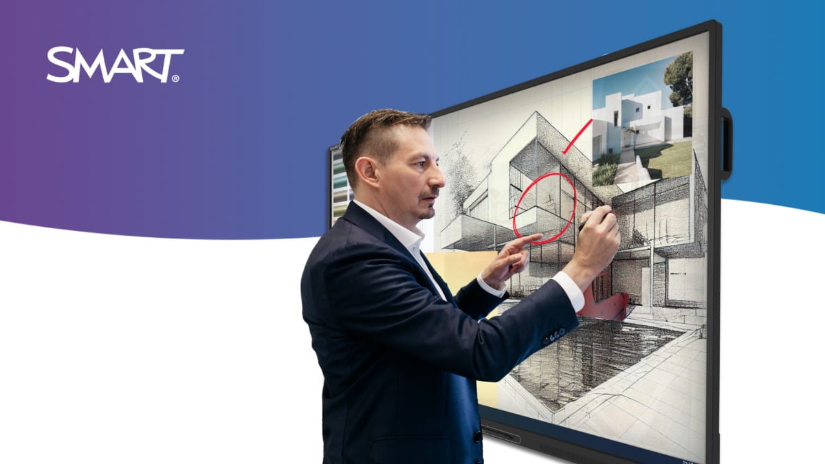 A professional annotating on a building design using the SMART Board GX Series.