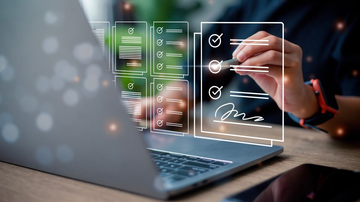 Laptop displaying a modern checklist application with touch interaction.