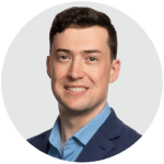 Headshot of Connor Blake, dressed in business attire.